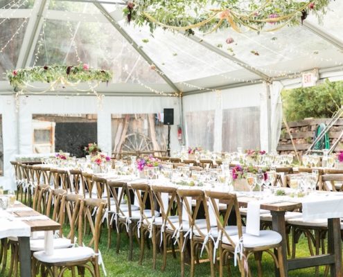 Clear Wedding Tent with Farm Tables & X Back Chairs
