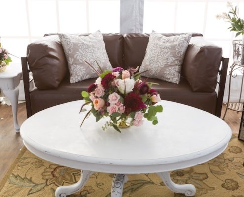Pecan Axis Lounge Furniture With Antique White Clawfoot Tables