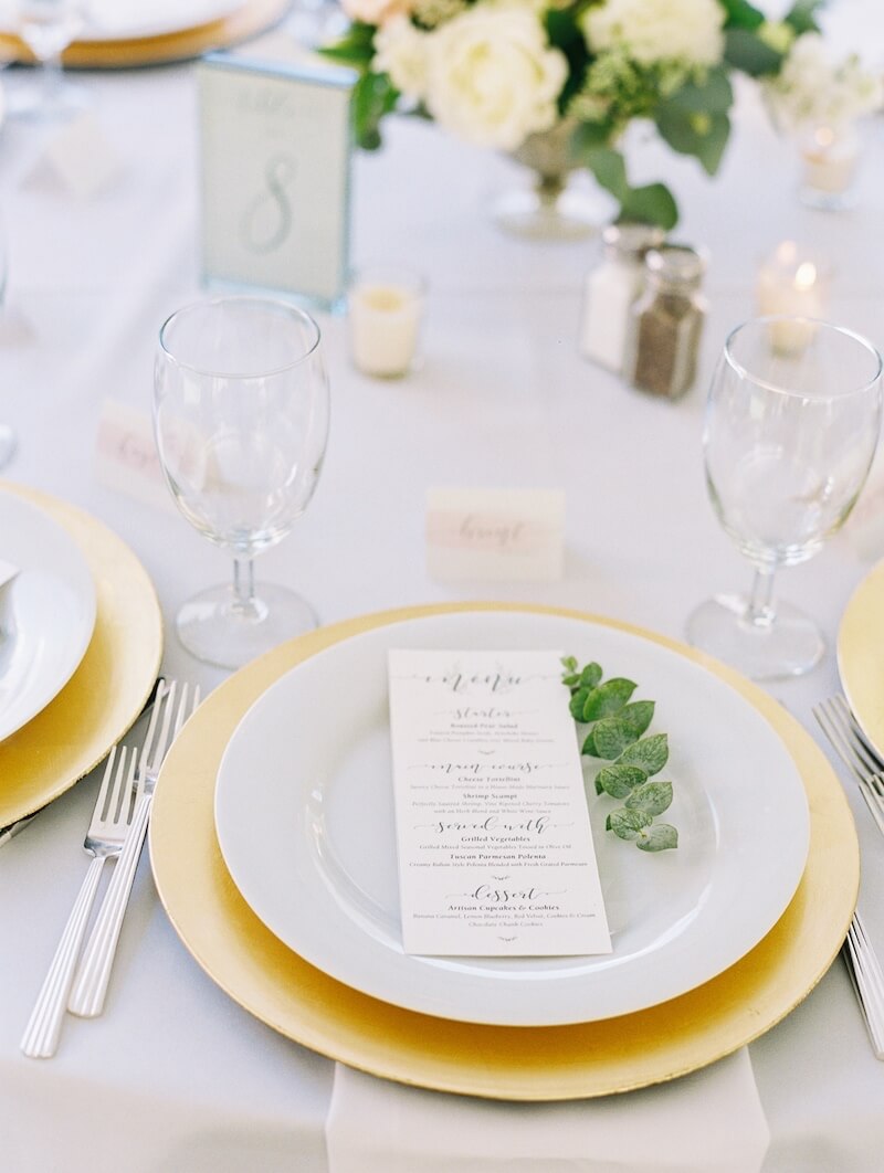 Place Setting With Deco Silverware Napa Glassware White China Gold Chargers Colorado Tents Events