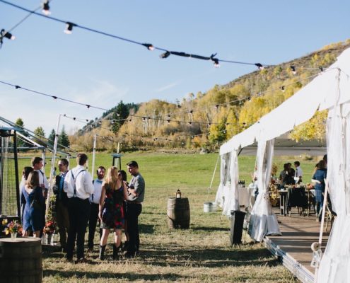 NaviTrac Tent With Wooden Strata Floor, Whiskey Barrels & Festival Lighting