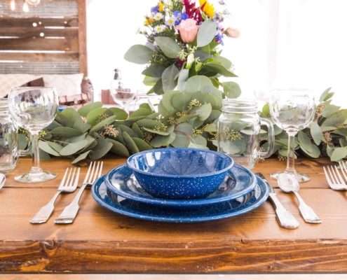 Farm Table With Western Blue China, Hammered Silverware, Napa Wine Glasses & Mason Jars