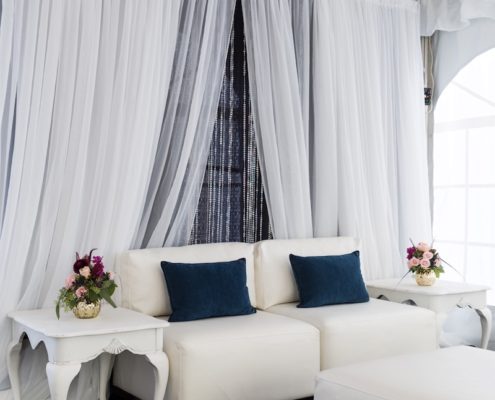 White Lounge Furniture With Antique Side Tables & Custom Draping