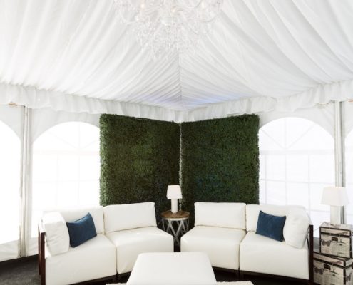 White Axis Lounge With Garden Walls, White Area Rug, Black Astro Turf & Side Tables