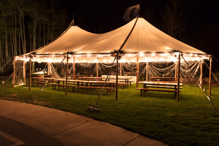 Aurora Sailcloth Tent with Clear Side Walls and Wood Poles