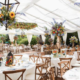Clear wedding tent with wedding draping