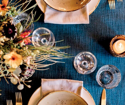 Rustic table setting with blue linen