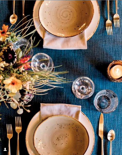 Rustic table setting with blue linen