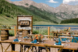 Outdoor Dining Farm Tables & Whiskey Barrel Bar at Piney River Ranch