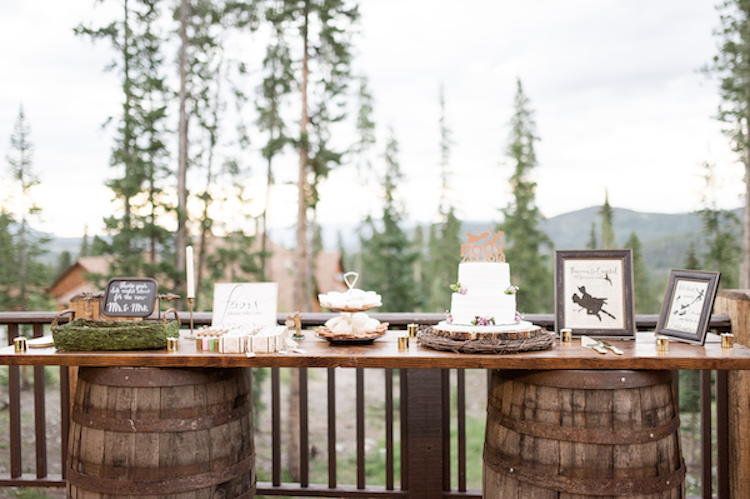 Rustic whiskey barrel dessert table