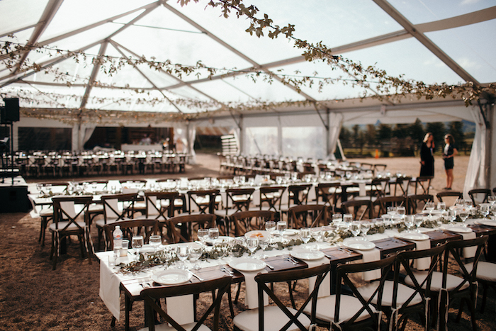 steamboat weddings Tent with Farm Tables