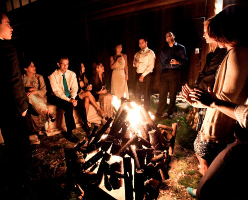 Wedding Guests Around Fire Pit