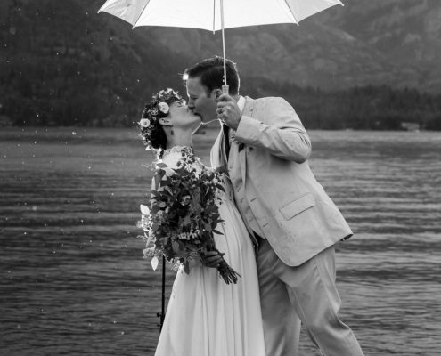 White Wedding Umbrellas for Rainy Wedding in Colorado