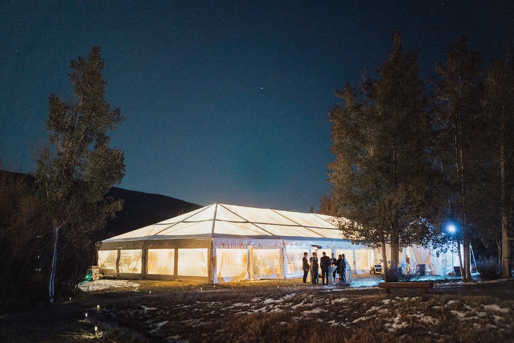 tented wedding venue in steamboat springs colorado at night