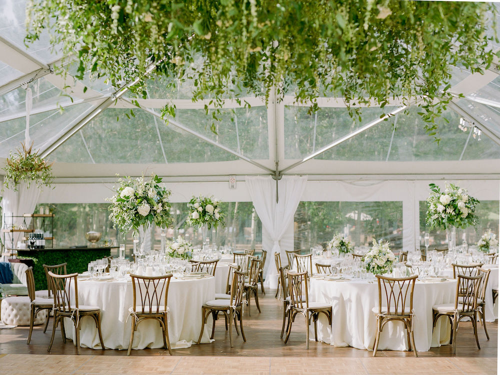 Ritz Carlton Bachelor Gulch wedding tent clear top with chiavari chairs