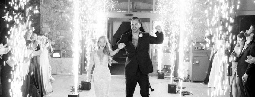 Black and white bride and groom Vail wedding entrance