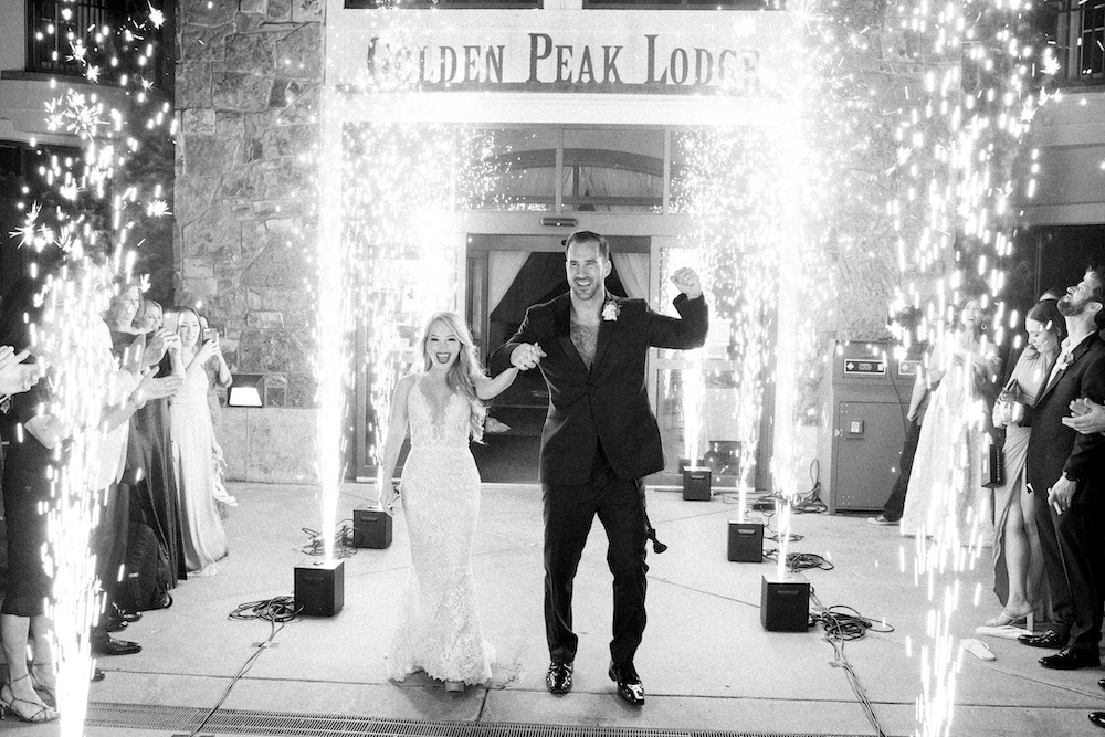 Black and white bride and groom Vail wedding entrance