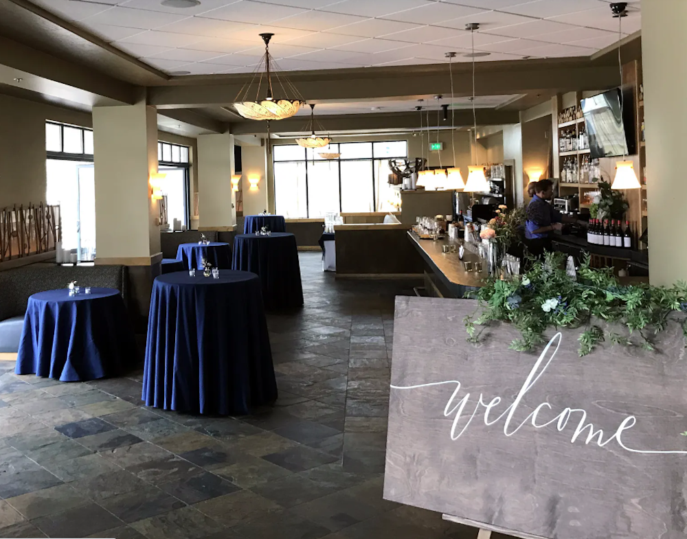 Indoor Larkspur wedding in Vail with welcome sign