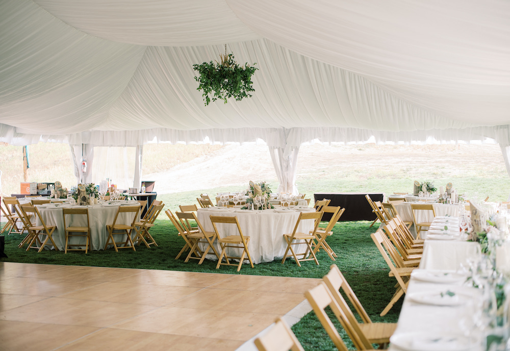birch dance floor in white fabric lined wedding tent Beaver Creek